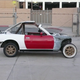 Illustration for article titled Eyesore Racings Ghettocharged Miata Fears No Turbocharged Peugeot Surrender Monkeys!